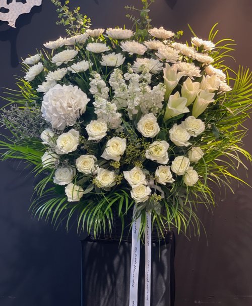 Classic White and Green Condolences Floral Stand