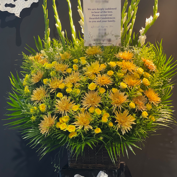 Yellow and white Colors of sympathy floral stand